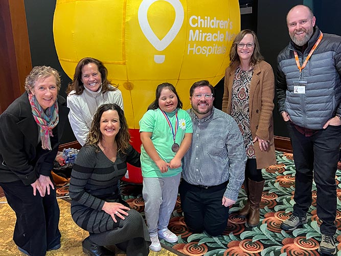 Solarity presenting donation to Children's Miracle Network