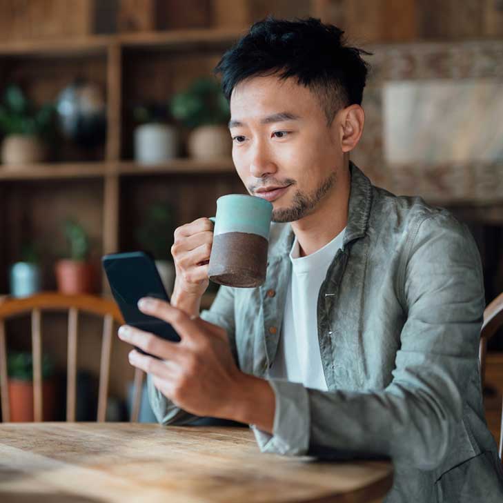 Young man contacting Solarity on his phone